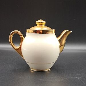 Vintage Warrented 22K Gold and Cream Teapot